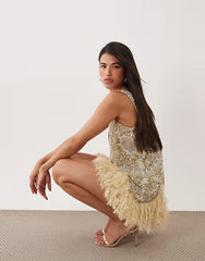 embellished scoop neck mini dress with faux feather hem in pale yellow