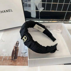 BLACK FABRIC WITH GOLD LOGO HAIRBAND 414448