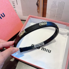 HEAD BAND IN BLACK LAMBSKIN AND RESIN 417299