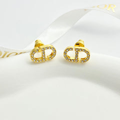 CD 26S Crystal Logo Stud Earrings In Gold Metal 633106