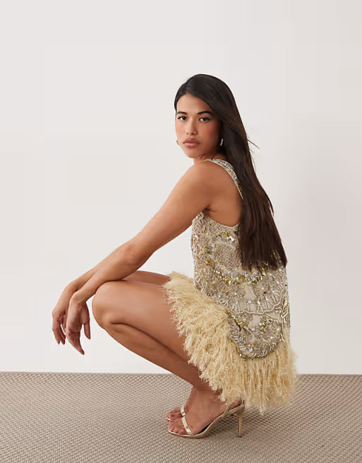 embellished scoop neck mini dress with faux feather hem in pale yellow